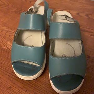 Really cute blue platform sandals  realty cushy insole- it’s like walking on air